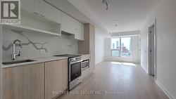 1611 - 100 QUEEN STREET E  Toronto, ON M5C 0B5