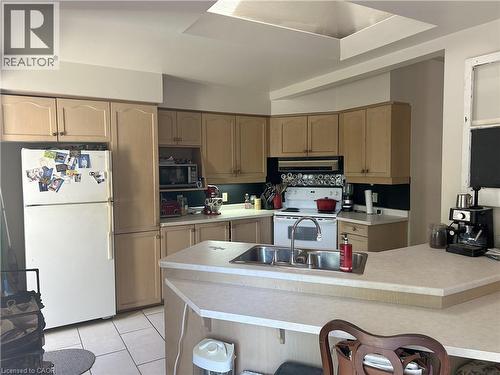 Lower unit - 100 Stanley Street, Simcoe, ON - Indoor Photo Showing Kitchen With Double Sink