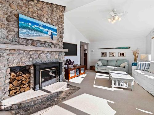 20 Lennox Road, Black Point, NS - Indoor Photo Showing Living Room With Fireplace
