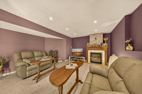 20B Wolf Crescent, Windermere, BC - Indoor Photo Showing Living Room With Fireplace