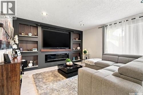 107 Hall Crescent, Saskatoon, SK - Indoor Photo Showing Living Room With Fireplace