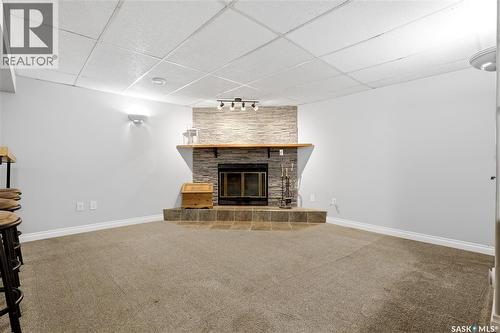 314 Howe Place, Regina, SK - Indoor Photo Showing Living Room With Fireplace