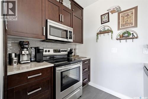 206 1715 Badham Boulevard, Regina, SK - Indoor Photo Showing Kitchen