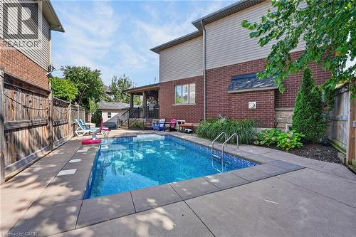 4079 Stadelbauer Drive, Beamsville, ON - Outdoor With In Ground Pool With Exterior