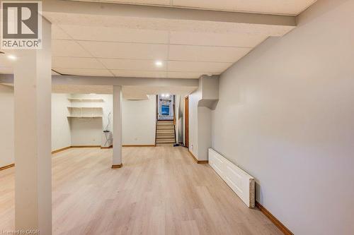 Spacious interior featuring light wood-finish flooring, recessed lighting, and built-in shelving - 3 Cora Drive, Kitchener, ON - Indoor