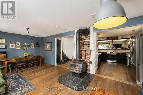 805092 Sideroad 25, Grey Highlands, ON - Indoor With Fireplace