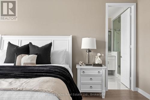 Primary bedroom to primary ensuite bathroom - 163 Springside Crescent, Blue Mountains, ON - Indoor Photo Showing Bedroom