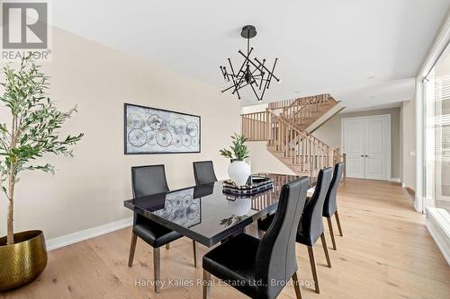 Dining room to staircase/front entry view - 163 Springside Crescent, Blue Mountains, ON - Indoor Photo Showing Dining Room