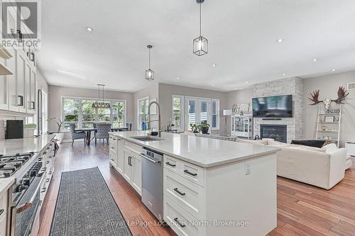 26 Spruce Street, Tiny, ON - Indoor Photo Showing Kitchen With Fireplace With Upgraded Kitchen