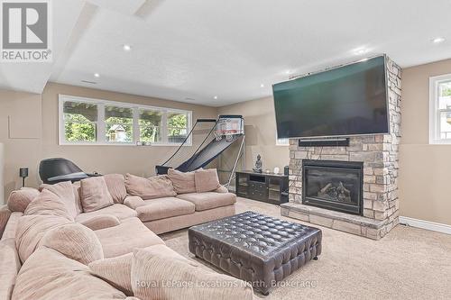 26 Spruce Street, Tiny, ON - Indoor Photo Showing Living Room With Fireplace