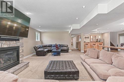 26 Spruce Street, Tiny, ON - Indoor Photo Showing Living Room With Fireplace