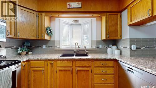 1015 Graham Road, Regina, SK - Indoor Photo Showing Kitchen With Double Sink
