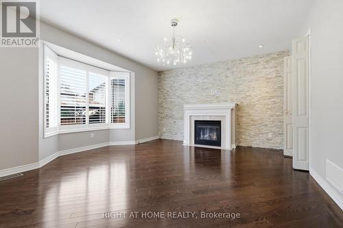4713 Thomas Alton Boulevard, Burlington, ON - Indoor Photo Showing Living Room With Fireplace