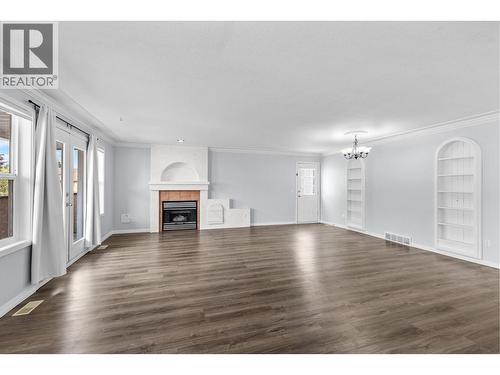 131 Celano Crescent, Kelowna, BC - Indoor Photo Showing Living Room With Fireplace