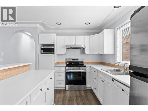 131 Celano Crescent, Kelowna, BC - Indoor Photo Showing Kitchen With Double Sink