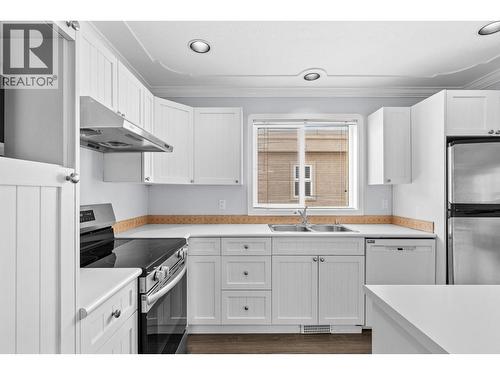 131 Celano Crescent, Kelowna, BC - Indoor Photo Showing Kitchen With Double Sink