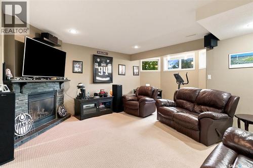 211 Crenshaw Way, Warman, SK - Indoor Photo Showing Other Room With Fireplace