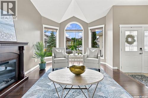 211 Crenshaw Way, Warman, SK - Indoor Photo Showing Living Room With Fireplace