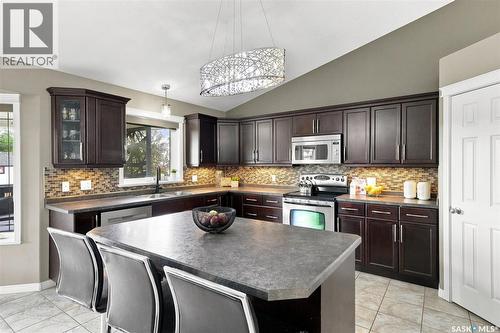 211 Crenshaw Way, Warman, SK - Indoor Photo Showing Kitchen With Double Sink