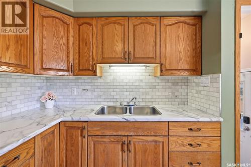 2004 Adelaide Street E, Saskatoon, SK - Indoor Photo Showing Kitchen With Double Sink