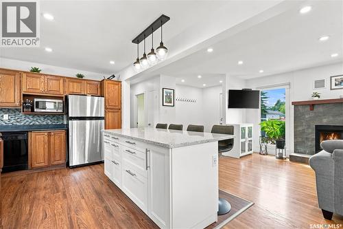 39 Brown Crescent, Saskatoon, SK - Indoor Photo Showing Kitchen With Fireplace