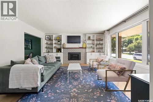 48 French Crescent, Regina, SK - Indoor Photo Showing Living Room With Fireplace