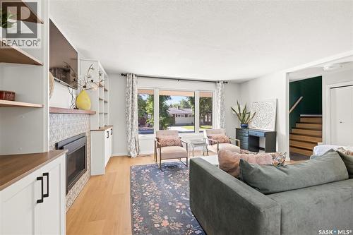 48 French Crescent, Regina, SK - Indoor Photo Showing Living Room With Fireplace