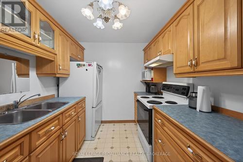 4670 Clearwater Road, Frontenac (Frontenac South), ON - Indoor Photo Showing Kitchen With Double Sink