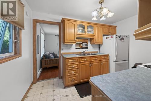 4670 Clearwater Road, Frontenac (Frontenac South), ON - Indoor Photo Showing Kitchen With Double Sink