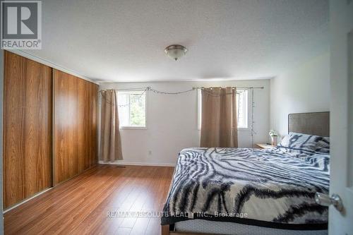 Primary bedroom A.I Edited to remove clutter/mess - 30 E Sonnet Crescent, Ottawa, ON - Indoor Photo Showing Bedroom