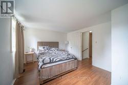Primary Bedroom A.I edited to remove clutter/mess - 