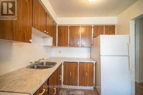 A.I Edited to remove clutter/mess - 30 E Sonnet Crescent, Ottawa, ON - Indoor Photo Showing Kitchen With Double Sink