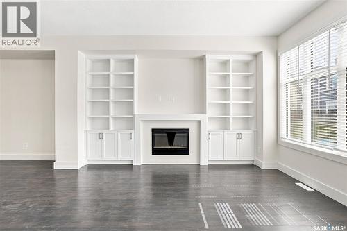 724 701 Meadows Boulevard, Saskatoon, SK - Indoor Photo Showing Living Room With Fireplace