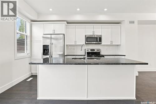724 701 Meadows Boulevard, Saskatoon, SK - Indoor Photo Showing Kitchen With Double Sink With Upgraded Kitchen