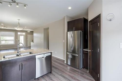 154 Philip Lee Dr, Winnipeg, MB - Indoor Photo Showing Kitchen With Double Sink