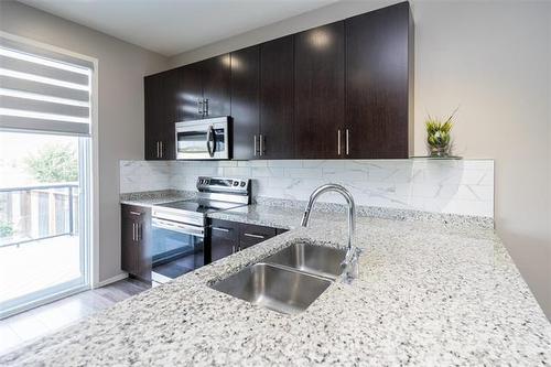154 Philip Lee Dr, Winnipeg, MB - Indoor Photo Showing Kitchen With Double Sink
