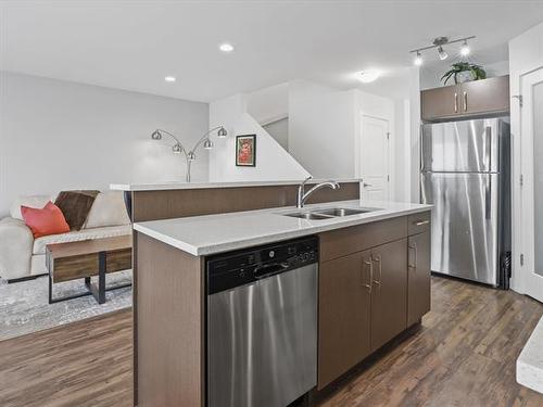 111-255 Peguis St, Winnipeg, MB - Indoor Photo Showing Kitchen With Double Sink