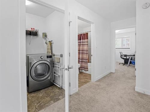 111-255 Peguis St, Winnipeg, MB - Indoor Photo Showing Laundry Room