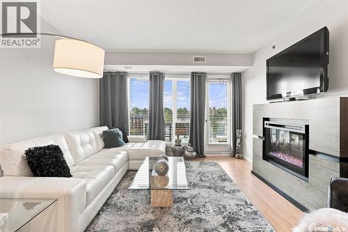 415 102 Kingsmere Place, Saskatoon, SK - Indoor Photo Showing Living Room With Fireplace