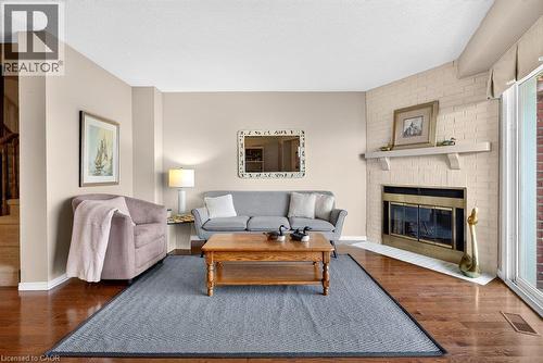 2136 Old Lakeshore Road Unit# 8, Burlington, ON - Indoor Photo Showing Living Room With Fireplace