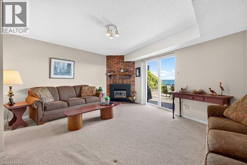 2136 Old Lakeshore Road Unit# 8, Burlington, ON - Indoor Photo Showing Living Room With Fireplace