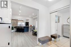 Mirrored sliding closet doors with white trim - 
