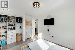 Recessed closet with integrated shelving and drawer storage - 