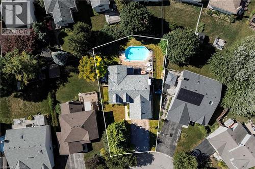 Expansive property featuring a private swimming pool, mature trees, and a spacious backyard - 364 Stoneheight Place, Waterloo, ON 