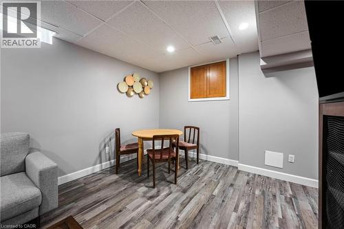 Wood-finish flooring with white baseboards and light gray walls - 364 Stoneheight Place, Waterloo, ON 