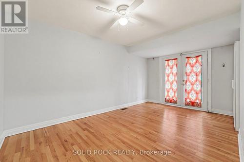 Primary bedroom with rear yard access - 889 Mountainview Avenue, Ottawa, ON 