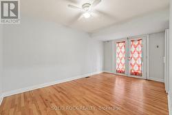Primary bedroom with rear yard access - 