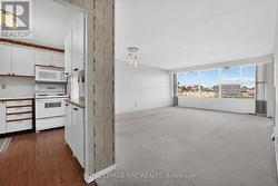VIEW INTO KITCHEN & DINING/LIVING ROOM - 