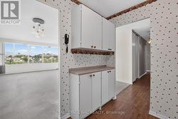 KITCHEN W/ VIEW TO LIVING ROOM - 