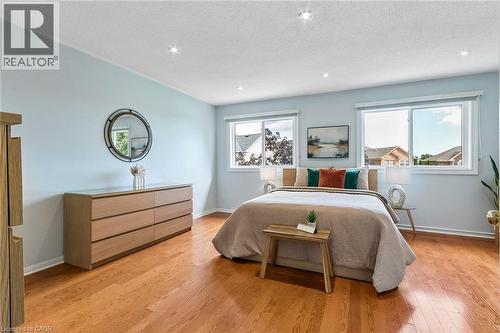 Hardwood flooring, recessed lighting, and multiple windows - 1373 Quest Circle, Mississauga, ON 